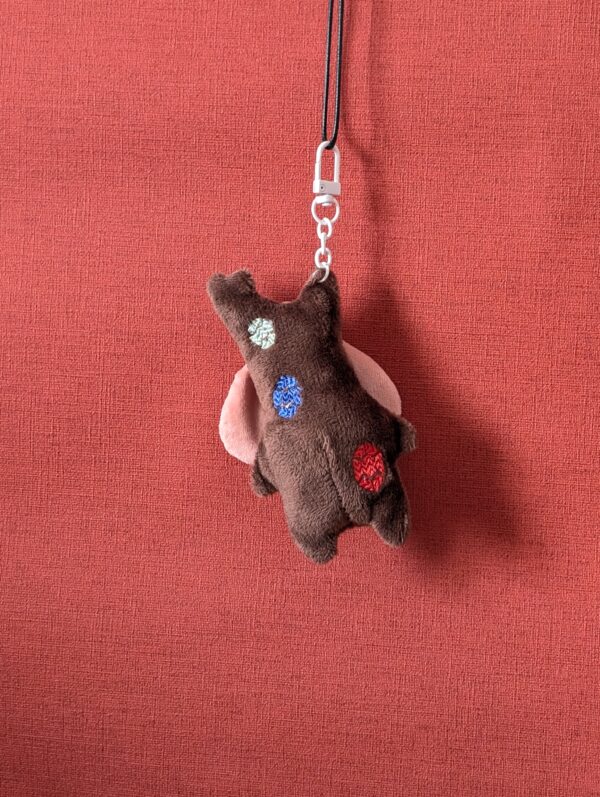 porte clé korogu automnes fait main secret de rubis